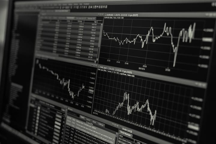 Monitor showing line charts and data tables